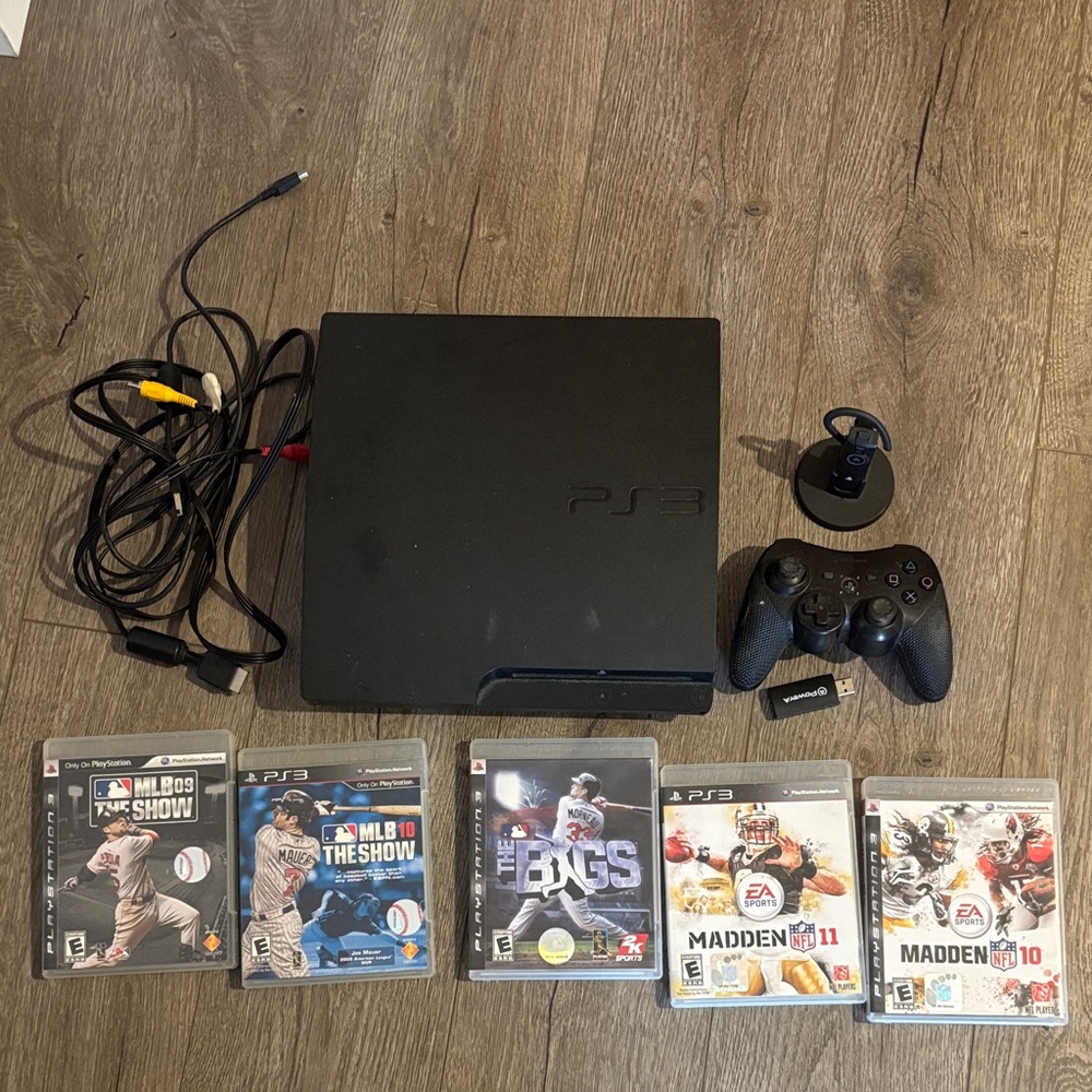 Sony PS3 with Controller, Head set, and 5 Games